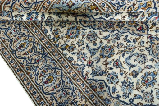 Close-up detail of 2000s Kashan rug from Iran / Persia showing Wool weave