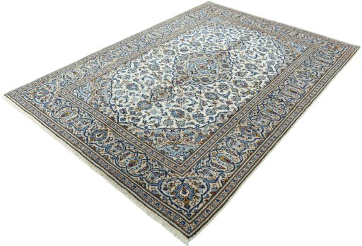 Corner detail of 2000s Kashan rug showing border pattern and Wool pile