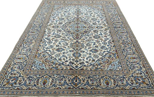 Surface texture of 2000s Kashan rug with natural Wool and intricate pattern