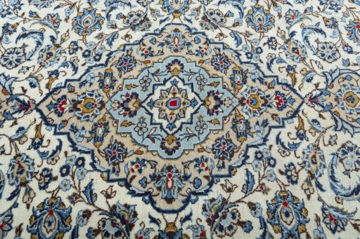 Central medallion detail of 2000s Kashan rug from Iran / Persia