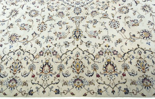 Corner detail of New Kashan rug showing border pattern and Wool pile