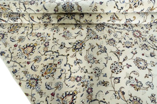 Close-up detail of New Kashan rug from Iran / Persia showing Wool weave