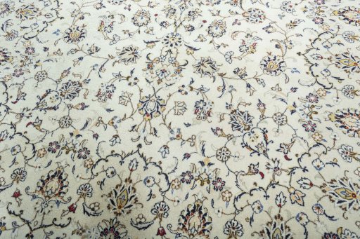 Close-up detail of New Kashan rug from Iran / Persia showing Wool weave