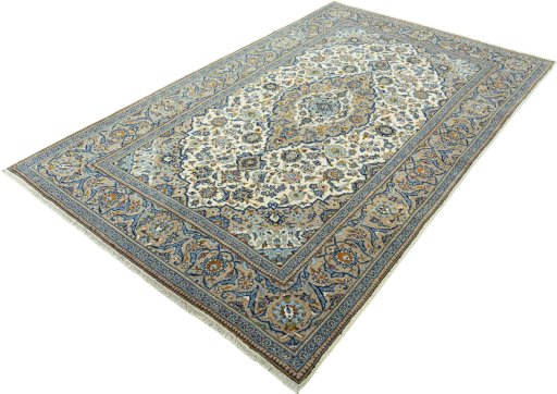 Corner detail of 2000s Kashan rug showing border pattern and Wool pile