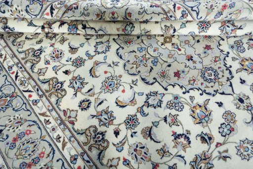 Close-up detail of 2000s Kashan rug from Iran / Persia showing Wool weave