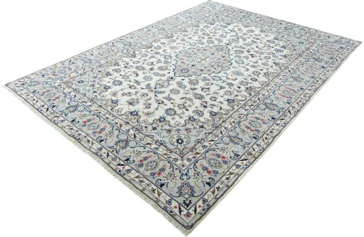 Corner detail of 2000s Kashan rug showing border pattern and Wool pile
