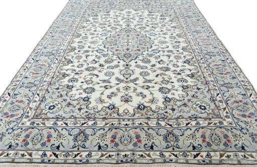 Surface texture of 2000s Kashan rug with natural Wool and intricate pattern