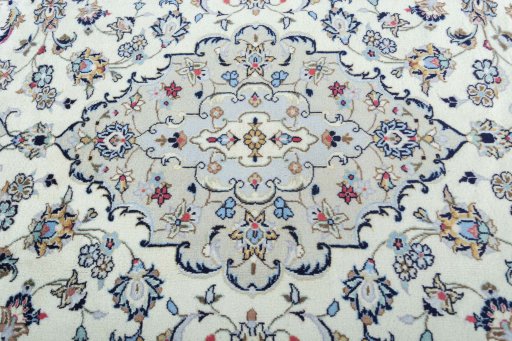 Central medallion detail of 2000s Kashan rug from Iran / Persia