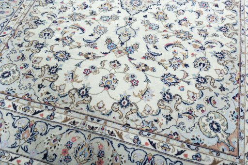 Close-up detail of 2000s Kashan rug from Iran / Persia showing Wool weave