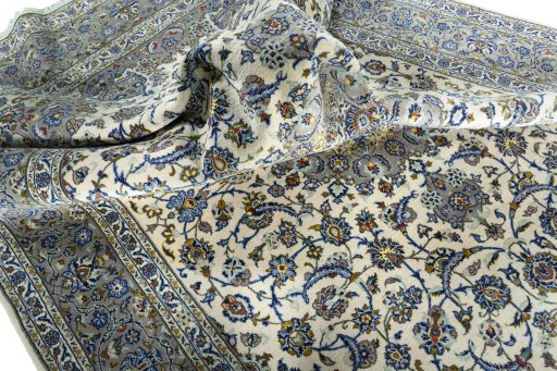 Surface texture of 2000s Kashan rug with natural Cork and intricate pattern