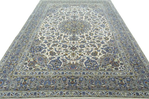 Surface texture of 2000s Kashan rug with natural Cork and intricate pattern