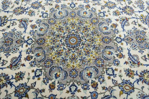 Central medallion detail of 2000s Kashan rug from Iran / Persia