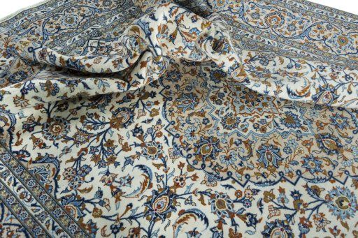 Surface texture of 2000s Kashan rug with natural Wool and intricate pattern