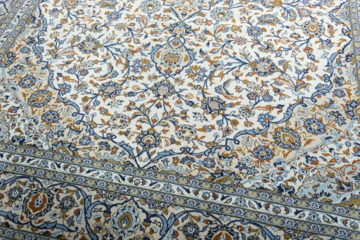 Close-up detail of 2000s Kashan rug from Iran / Persia showing Wool weave