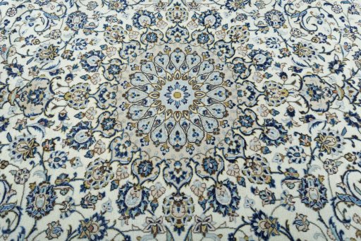 Central medallion detail of 2000s Kashan rug from Iran / Persia