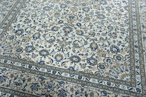 Close-up detail of 2000s Kashan rug from Iran / Persia showing Wool weave