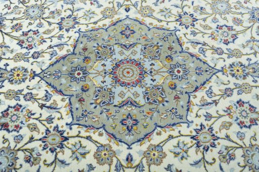 Central medallion detail of 2000s Kashan rug from Iran / Persia