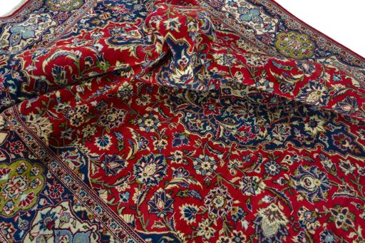 Surface texture of 2000s Kashan rug with natural Wool and intricate pattern