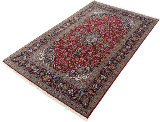 Corner detail of New Kashan rug showing border pattern and Cork pile