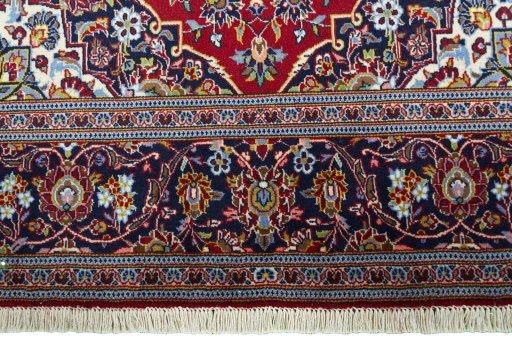 Full view of New Kashan rug from Iran / Persia, 225 × 137 cm in Red tones