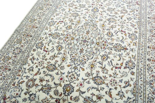 Backside of handmade New Kashan rug showing knot structure and weave density