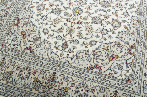 Close-up detail of New Kashan rug from Iran / Persia showing Wool weave