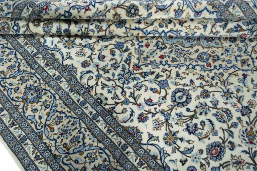 Close-up detail of New Kashan rug from Iran / Persia showing Wool weave