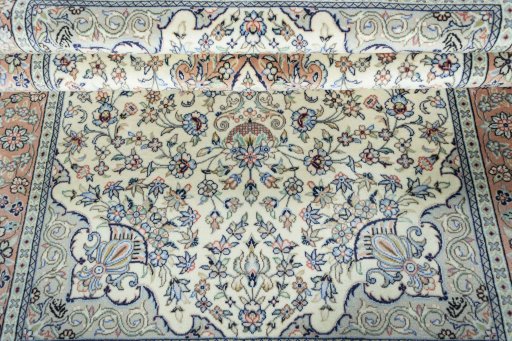 Close-up detail of New Kashan rug from Iran / Persia showing Wool weave