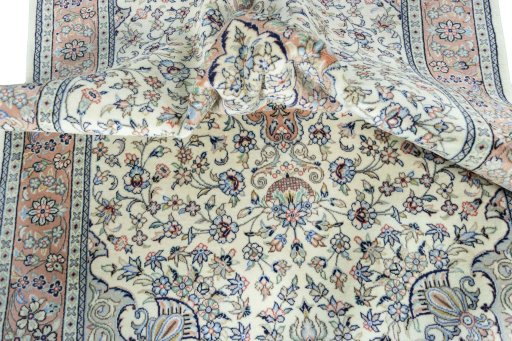 Surface texture of New Kashan rug with natural Wool and intricate pattern