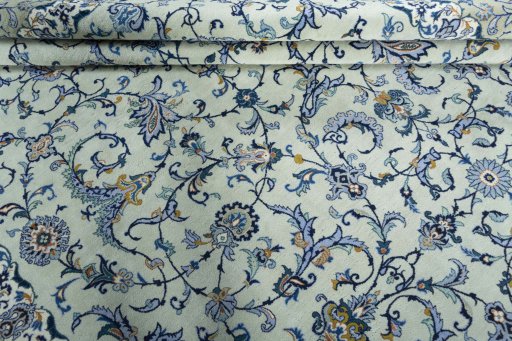 Close-up detail of 2000s Kashan rug from Iran / Persia showing Wool weave