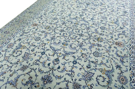 Backside of handmade 2000s Kashan rug showing knot structure and weave density