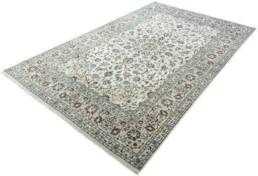 Corner detail of 2000s Kashan rug showing border pattern and Wool pile