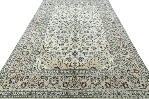 Surface texture of 2000s Kashan rug with natural Wool and intricate pattern