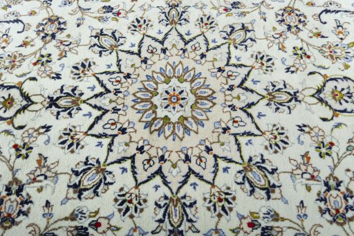 Central medallion detail of 2000s Kashan rug from Iran / Persia