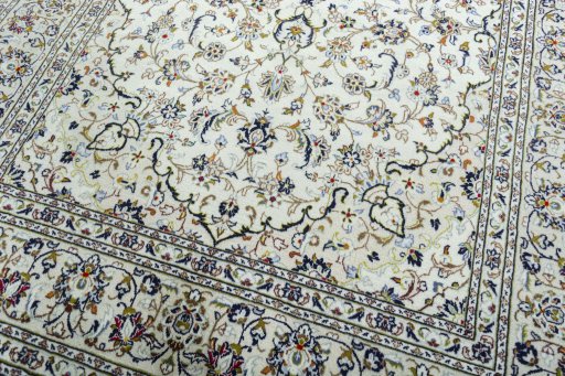 Close-up detail of 2000s Kashan rug from Iran / Persia showing Wool weave