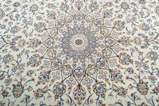 Central medallion detail of 2000s Kashan rug from Iran / Persia