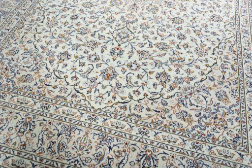 Close-up detail of 2000s Kashan rug from Iran / Persia showing Wool weave
