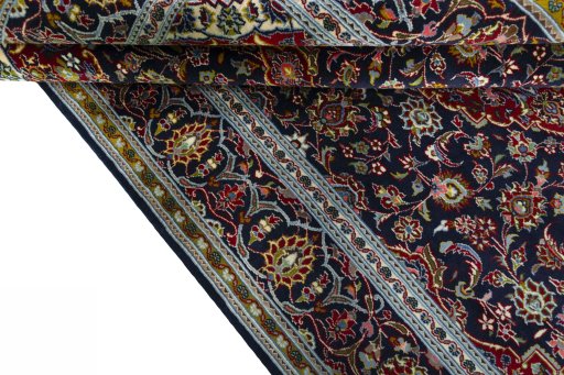 Close-up detail of New Kashan rug from Iran / Persia showing Cork weave