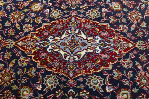 Central medallion detail of New Kashan rug from Iran / Persia