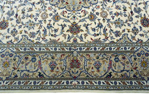 Corner detail of New Kashan rug showing border pattern and Cork pile