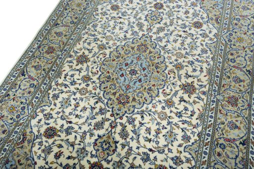 Backside of handmade New Kashan rug showing knot structure and weave density