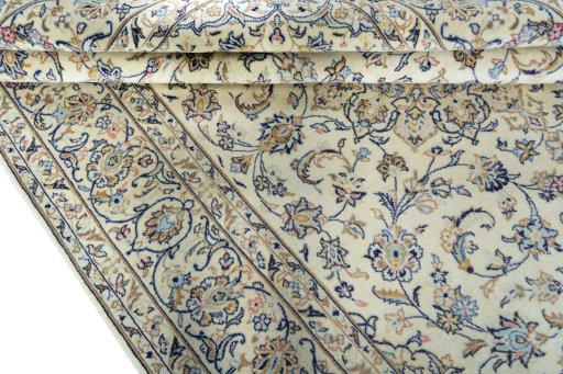 Close-up detail of New Kashan rug from Iran / Persia showing Wool weave