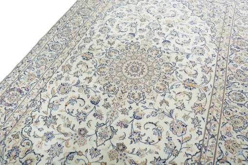 Backside of handmade New Kashan rug showing knot structure and weave density
