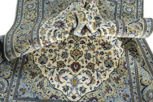 Surface texture of New Kashan rug with natural Cork and intricate pattern