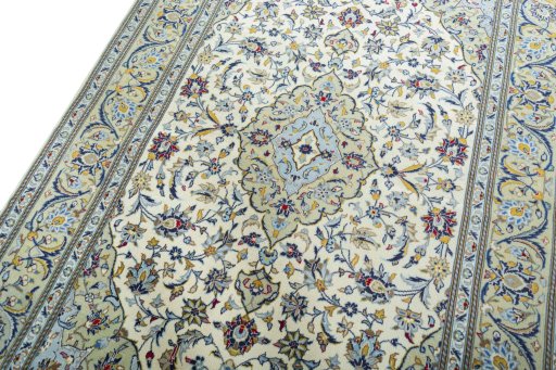 Backside of handmade New Kashan rug showing knot structure and weave density