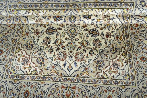 Close-up detail of 1970s Kashan rug from Iran / Persia showing Wool weave