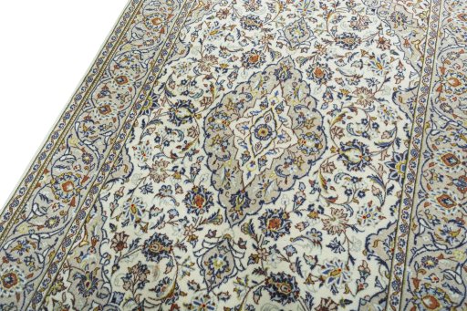 Backside of handmade 1970s Kashan rug showing knot structure and weave density