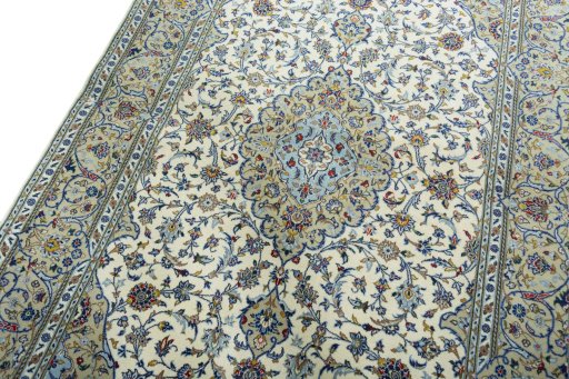 Backside of handmade New Kashan rug showing knot structure and weave density