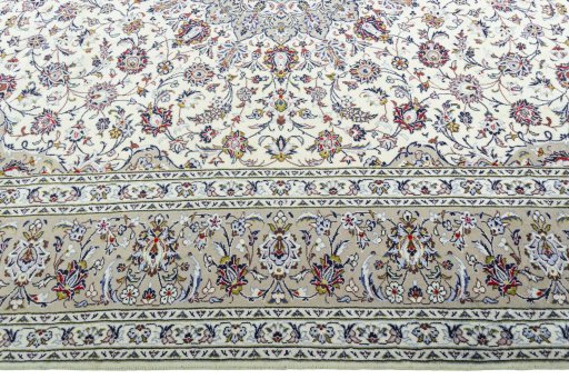 Corner detail of New Kashan rug showing border pattern and Wool pile