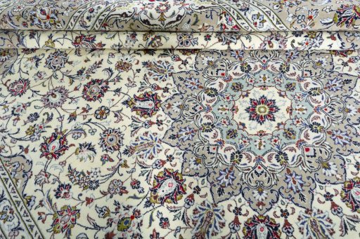 Close-up detail of New Kashan rug from Iran / Persia showing Wool weave